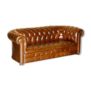 Restored Chesterfield leather sofa in vintage Art Deco style