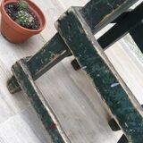 Former green workshop stool