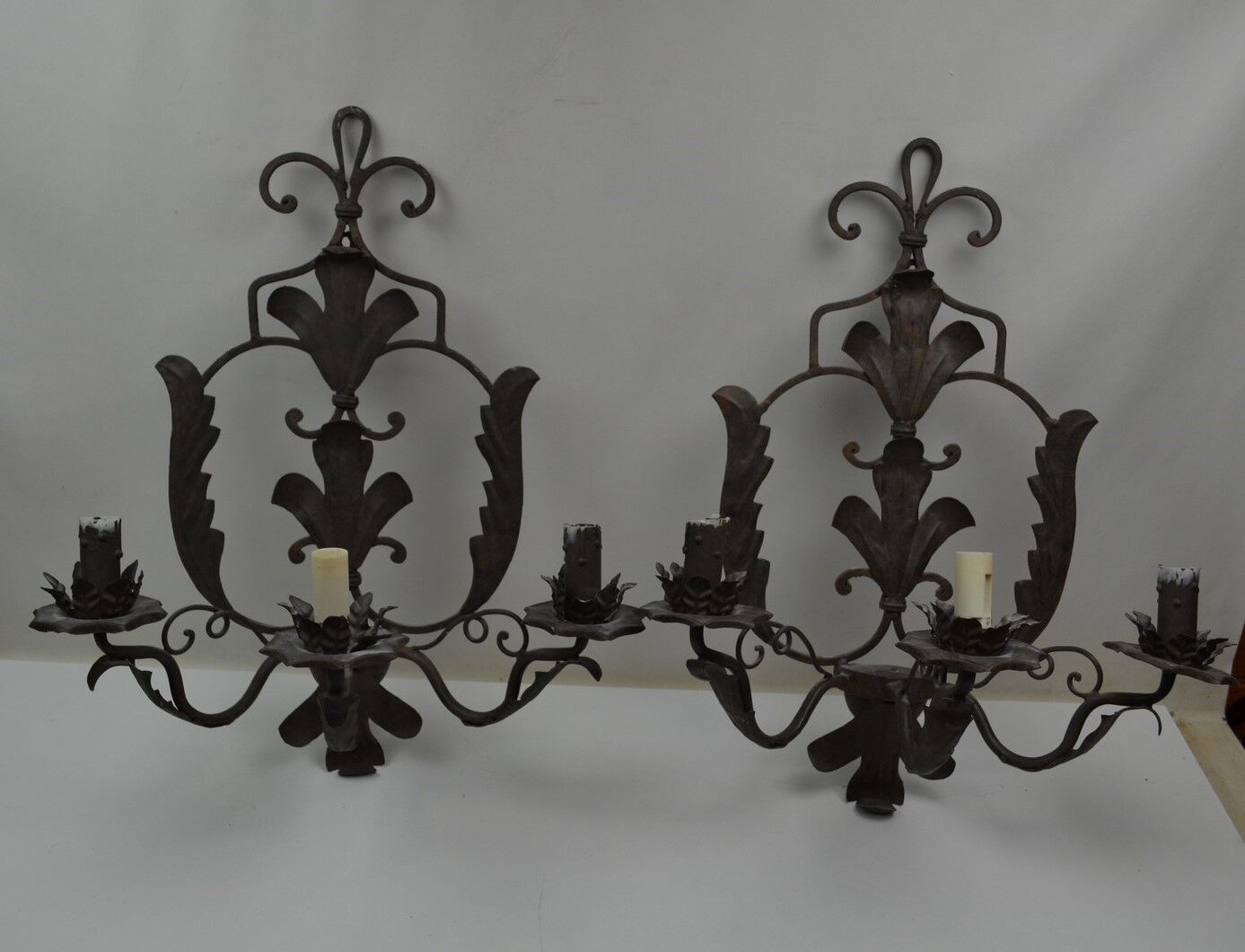 Pair of grey patinated iron wall lamps