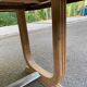 Art Deco dining table with a central pedestal, stripped in solid oak, with 2 extensions.