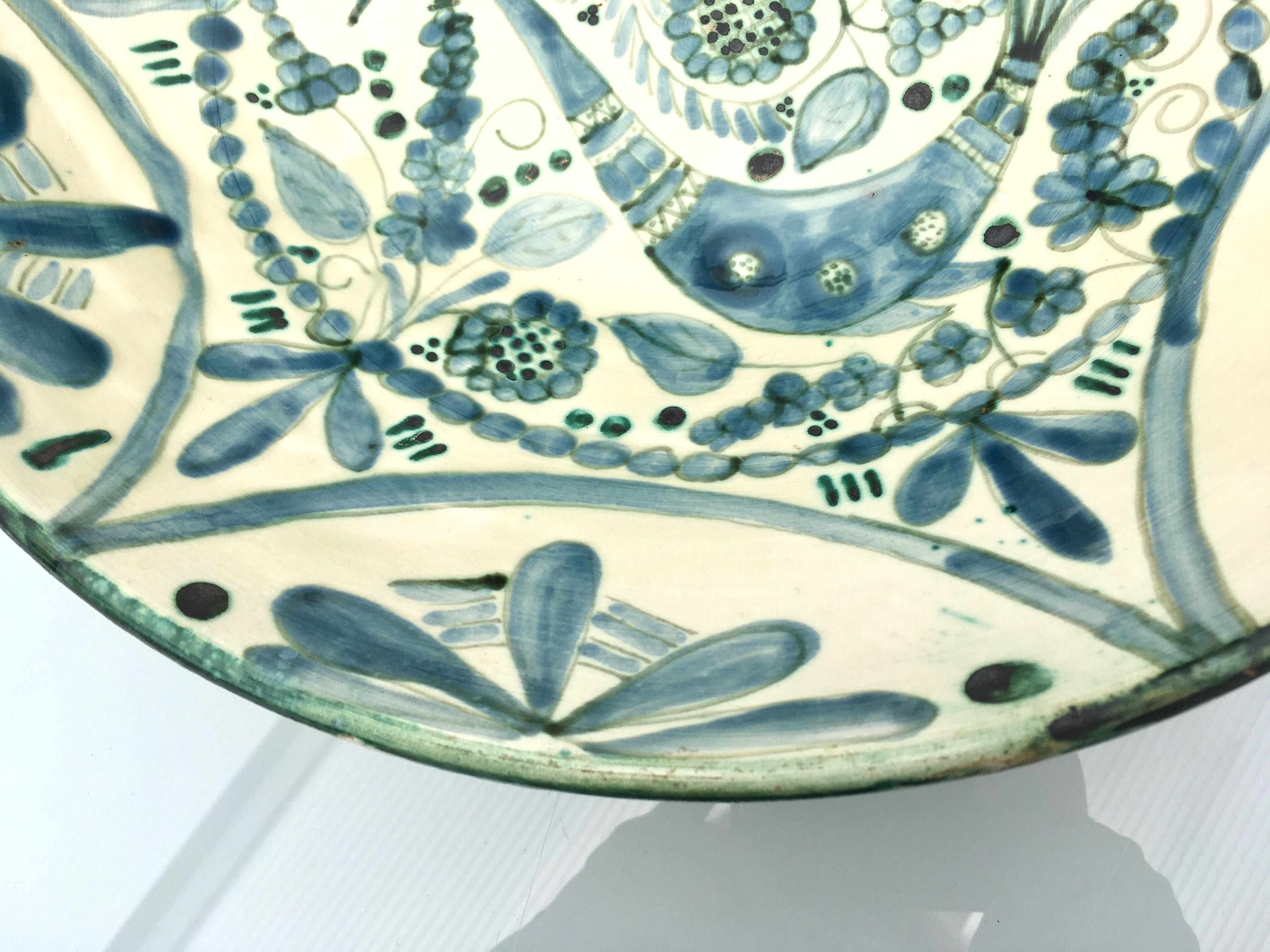 Large ceramic fruit cup with blue peacock