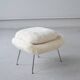 Womb Chair and Ottoman in fluffy white fabric by Eero Saarinen