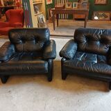 Pair of designer leather armchairs by Tobia Scarpa