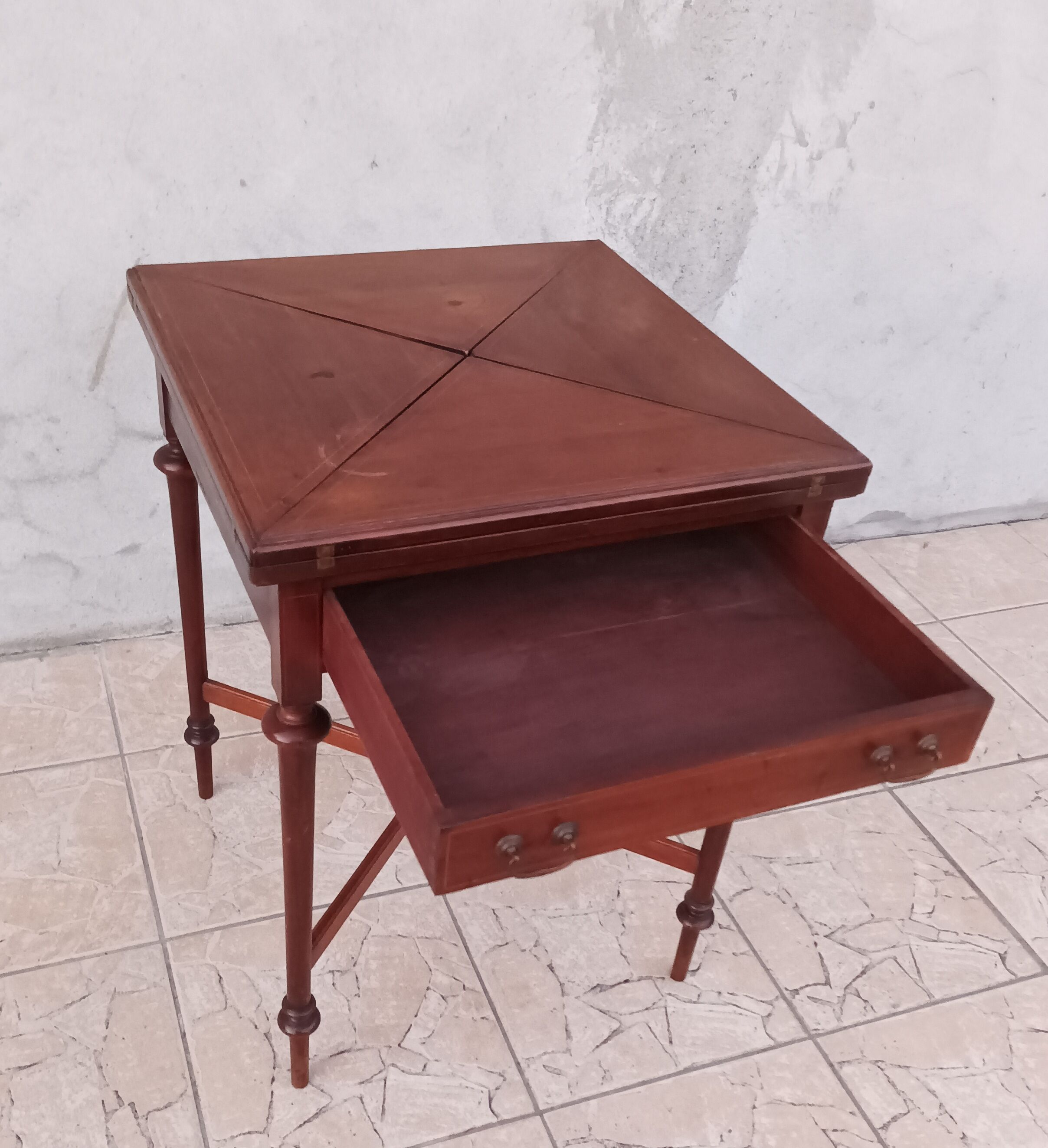 Game table in mahogany late 19th