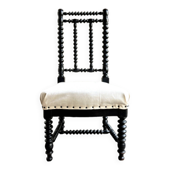Chaise en bois tourné noir et métis beige