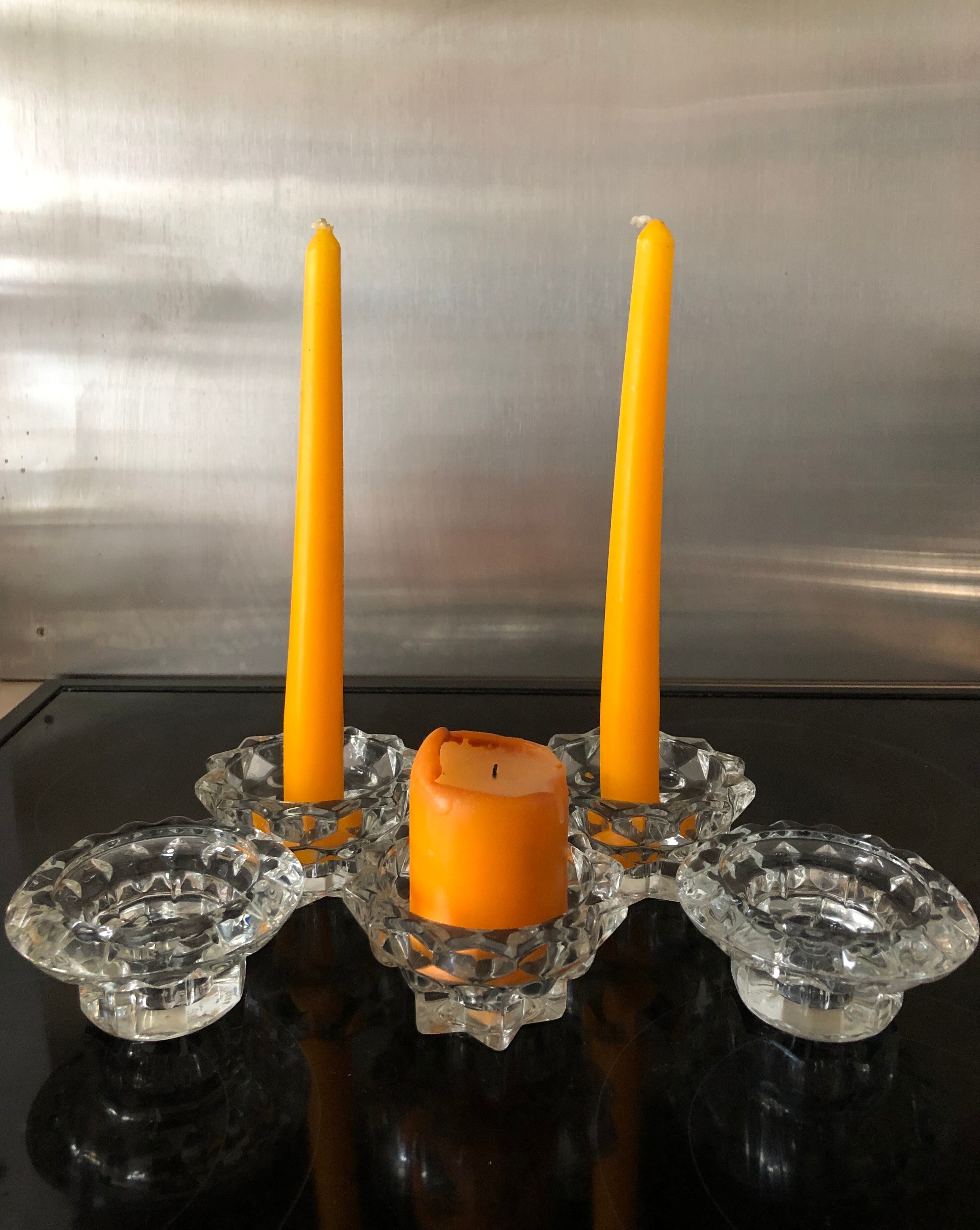 Set of 5 glass candlesticks