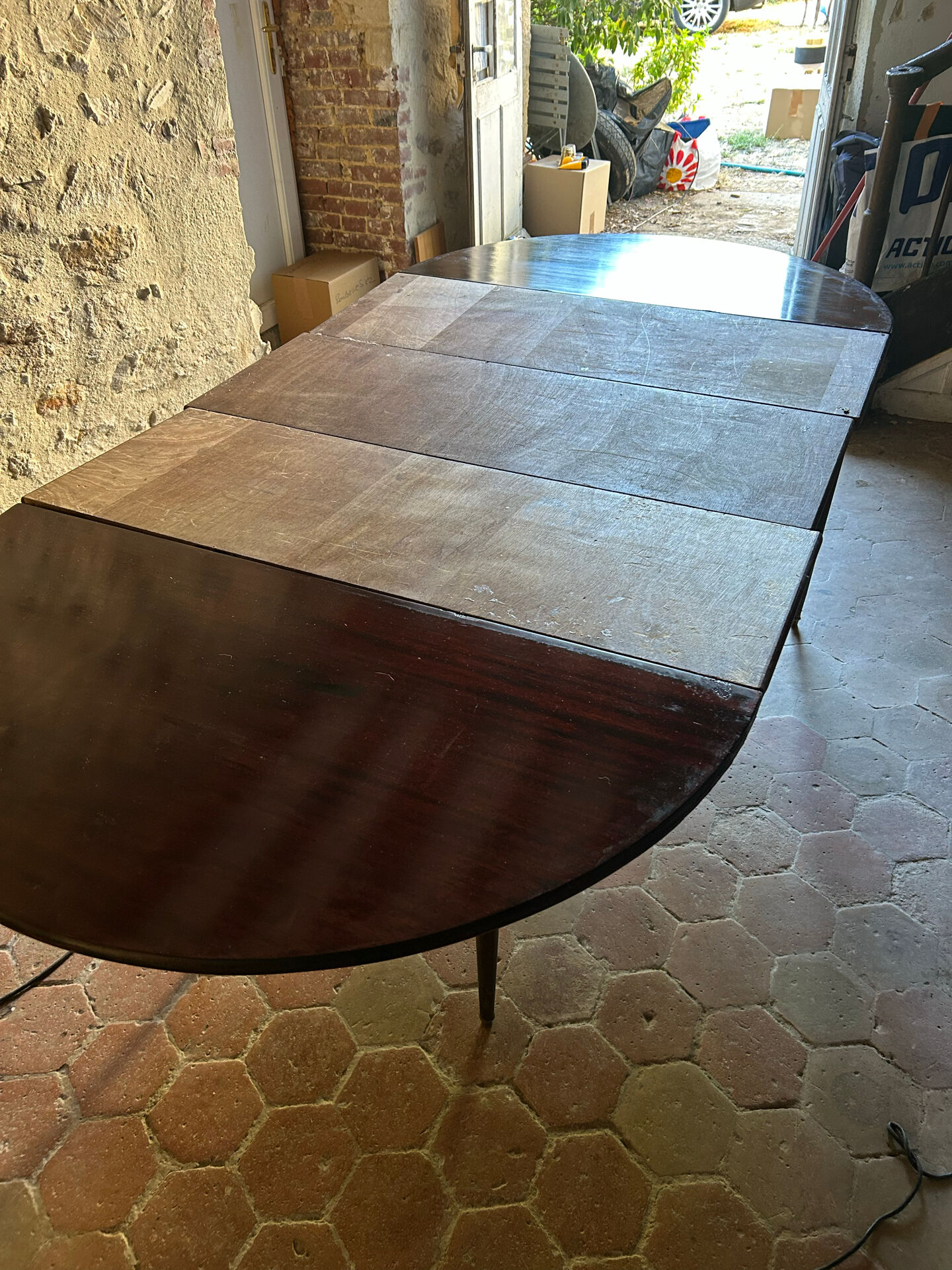 Half-moon table in mahogany, Louis XVI style.