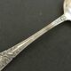 Set of 11 SFAM silver metal teaspoons.