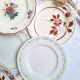 Vintage flower dessert plates from Sarreguemines, Longwy, and Lunéville.