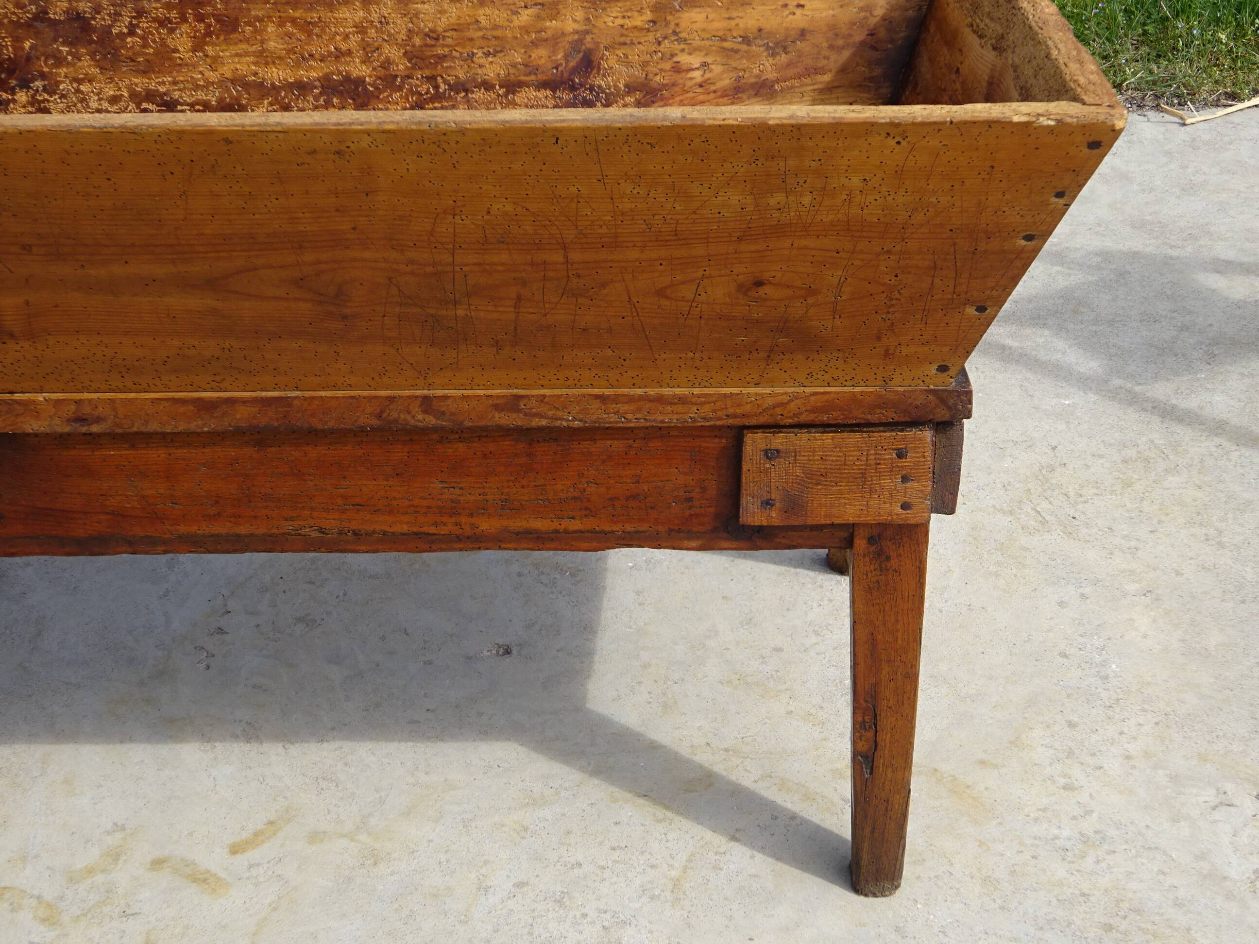 Very old solid oak dough trough with a lid and removable legs.