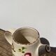 Ceramic water pitcher decorated with flowers