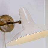 White Cream Articulating Arm Sconce in the style Giuseppe Ostuni