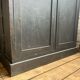 Old wooden locker with black patina