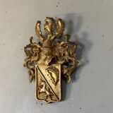 Heraldic cartouche in carved and gilded wood, Belgium, 19th century