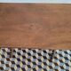 Brutalist coffee table with turned wooden legs