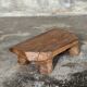 Small stool, teak footrest with short cut corners.