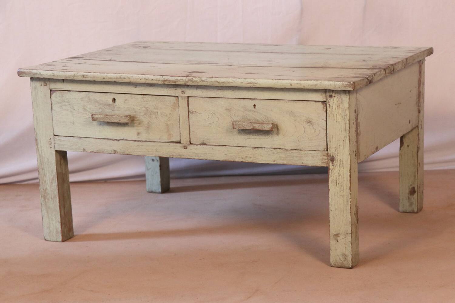 Antique bedside table in Burmese teak with original green cream patina.