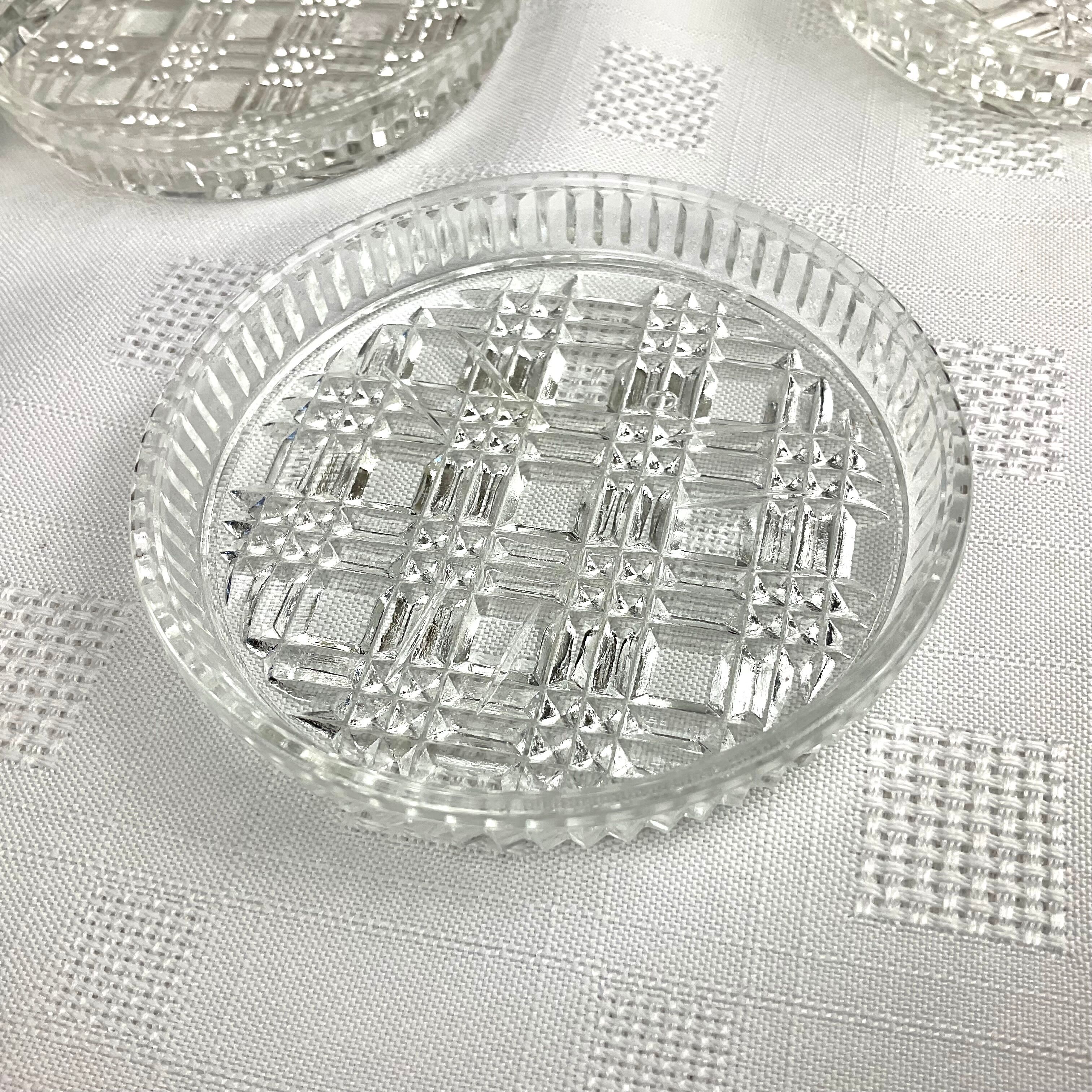 Series of 4 vintage glass coasters