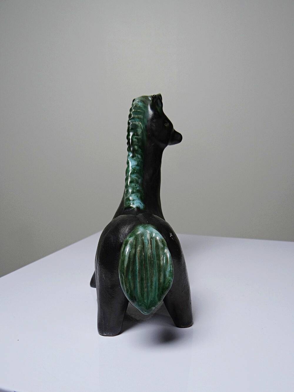 Stylised vintage horse in black and green glazed clay, handcrafted.