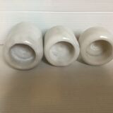 9 marble candle holders of different sizes