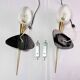 Maison Arlus Pair of brass and black wall sconces, France Mid-Century