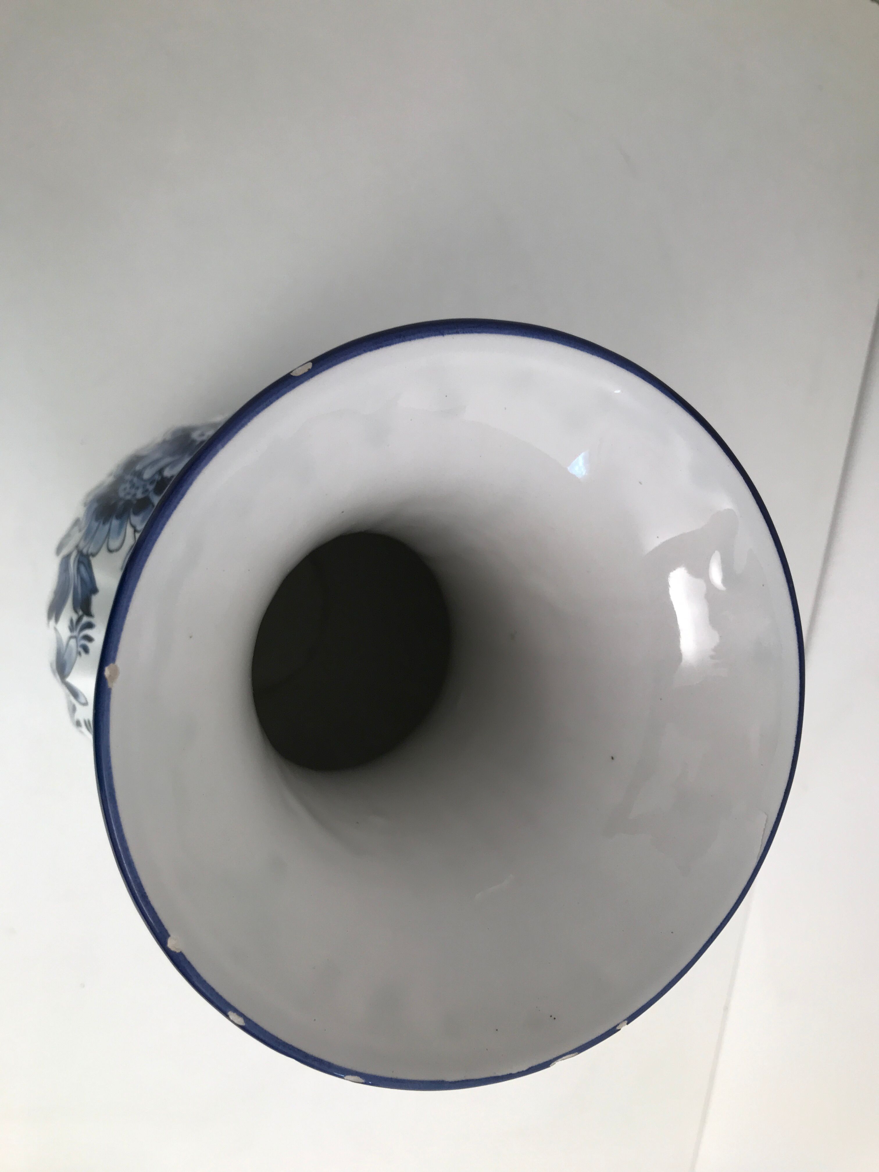 Vase with vintage blue and white flower pattern signed