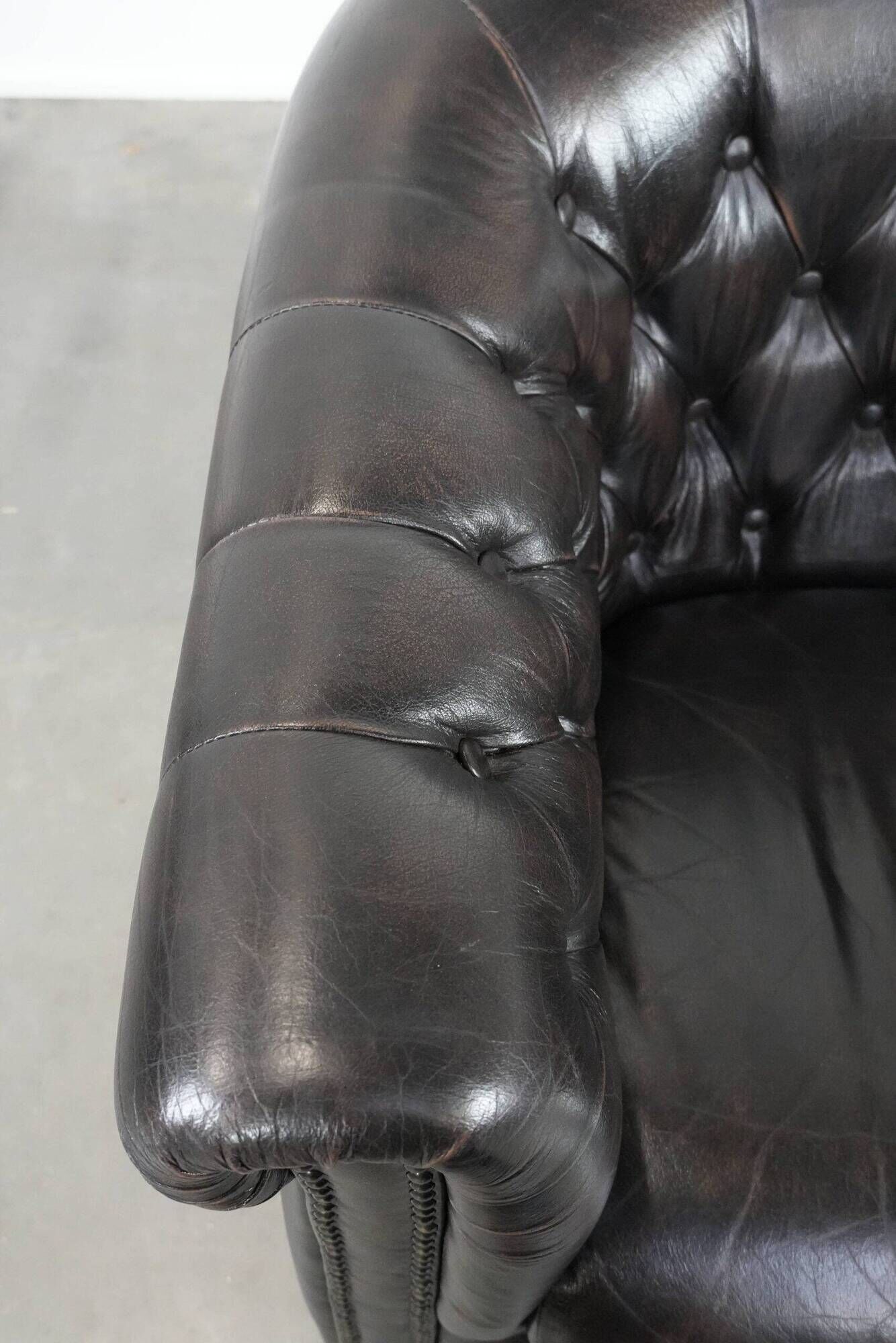 Luxury dark cowhide Chesterfield club armchair in English style