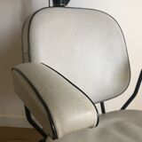 Vintage hairdresser's armchair with helmet transformed into a lamp