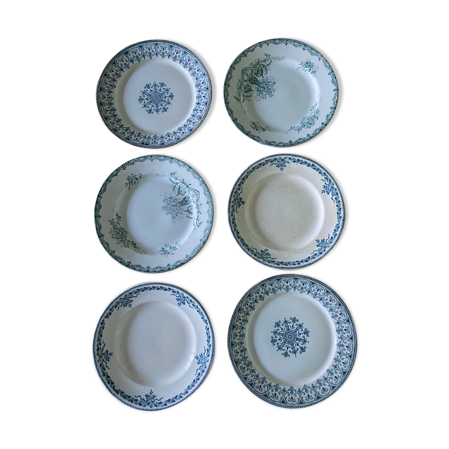 Set of 6 old flat plates in mismatched iron earth