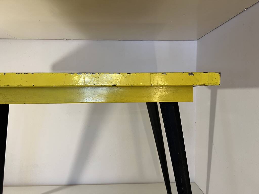 Table in the style of patinated yellow metal Tolix.