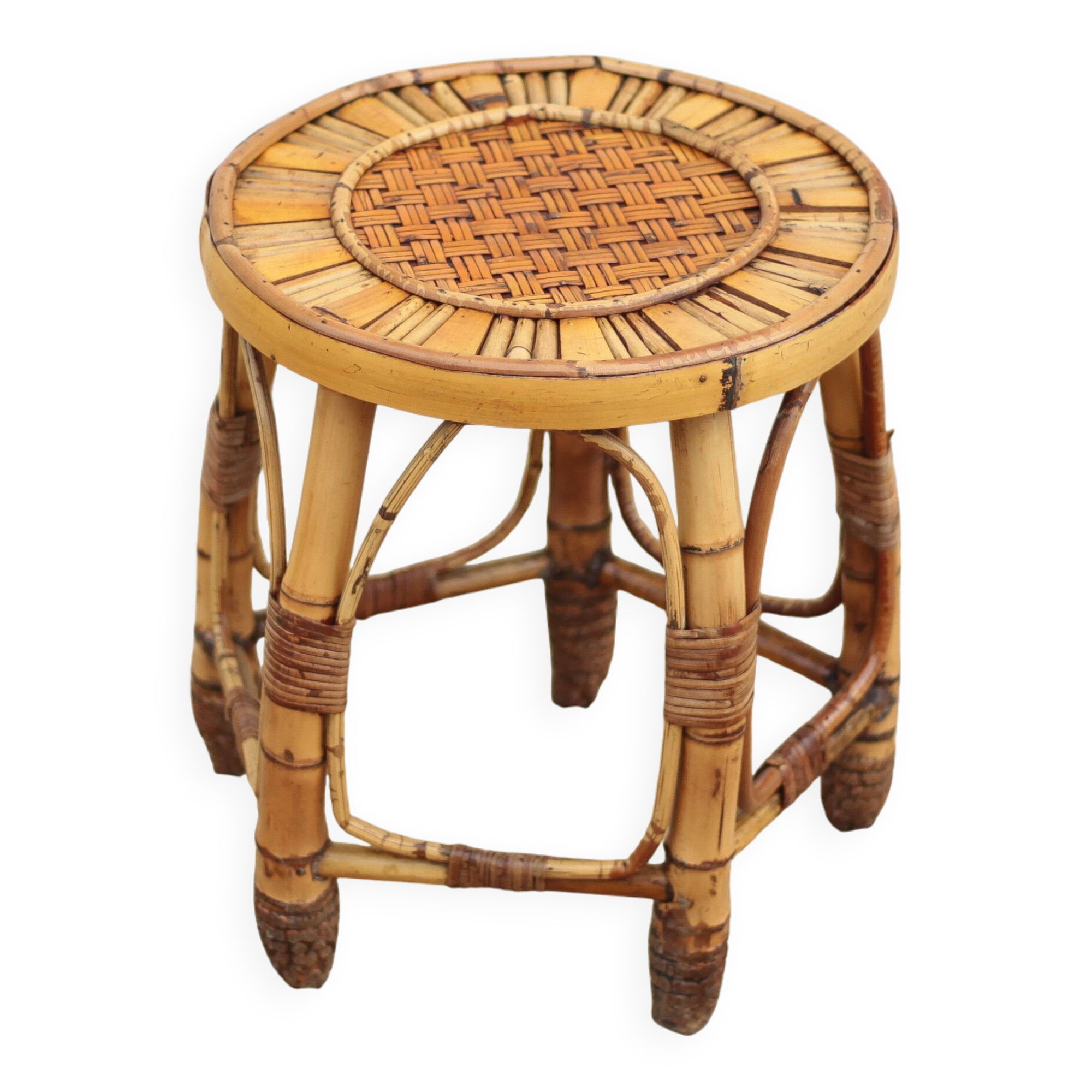 Vintage bamboo stool, woven rattan plant stand, interior decoration.