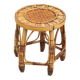 Vintage bamboo stool, woven rattan plant stand, interior decoration.