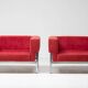 Red Kiushu armchairs by Saporiti characteristic of mid-20th century Italian modern design.
