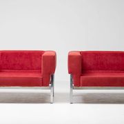 Red Kiushu armchairs by Saporiti characteristic of mid-20th century Italian modern design.