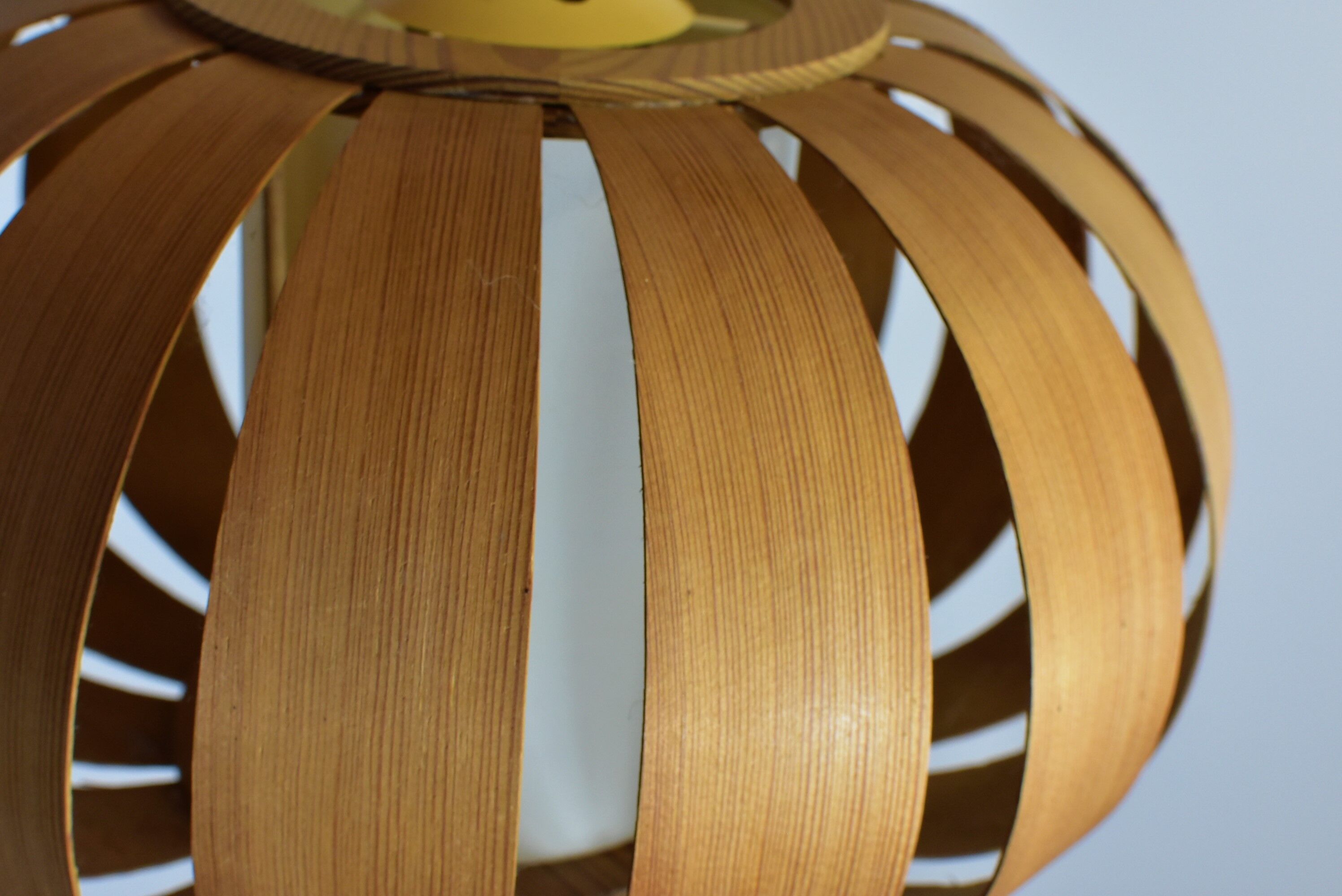 Scandinavian-style wooden pendant light.