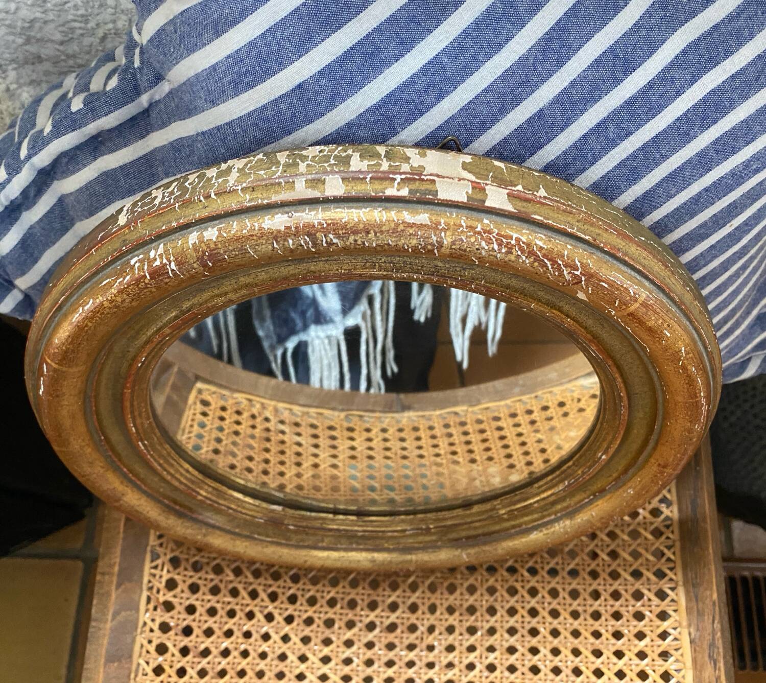 Miroir rond en bois doré ancien