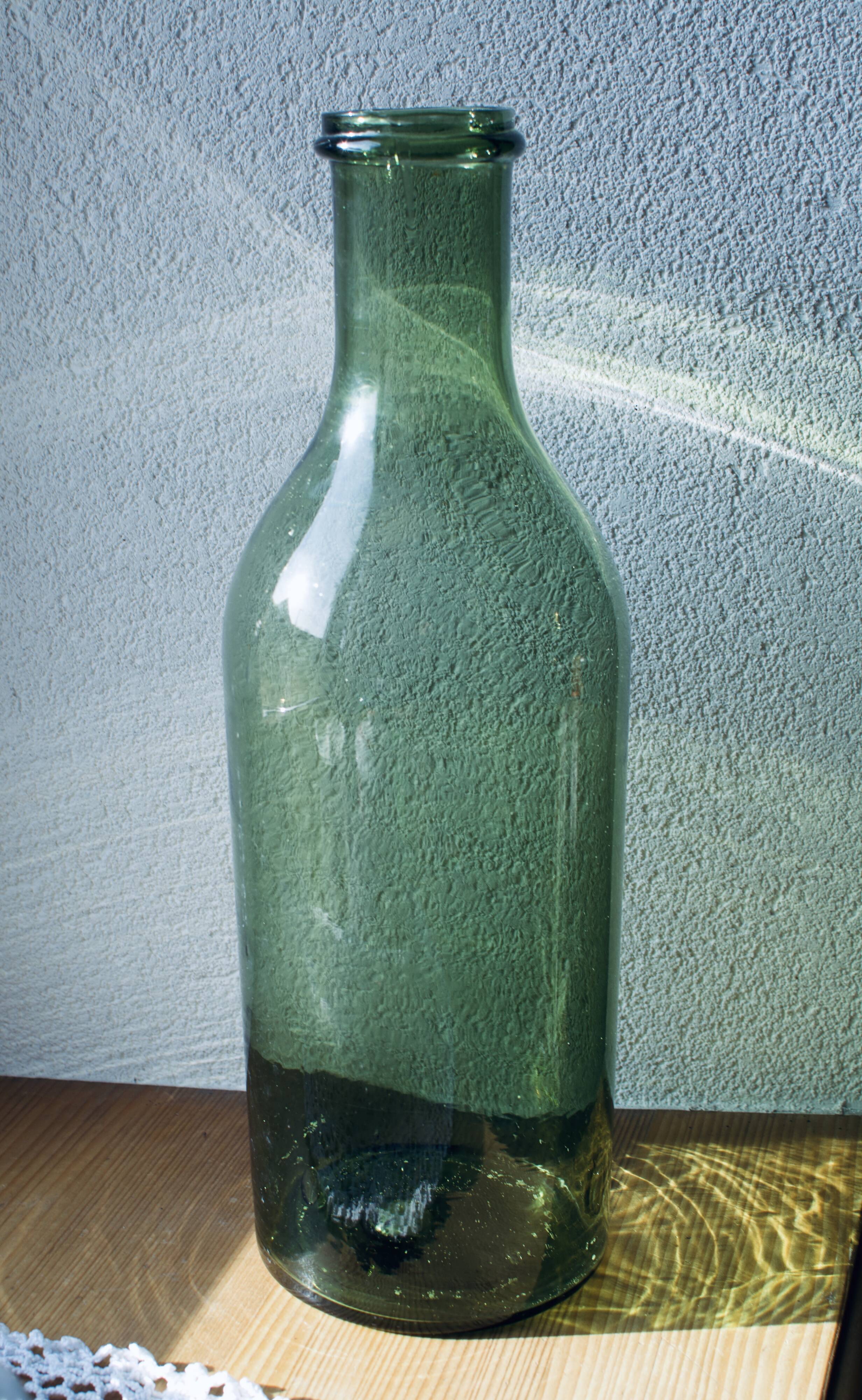 Green blown glass canister