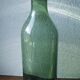 Green blown glass canister