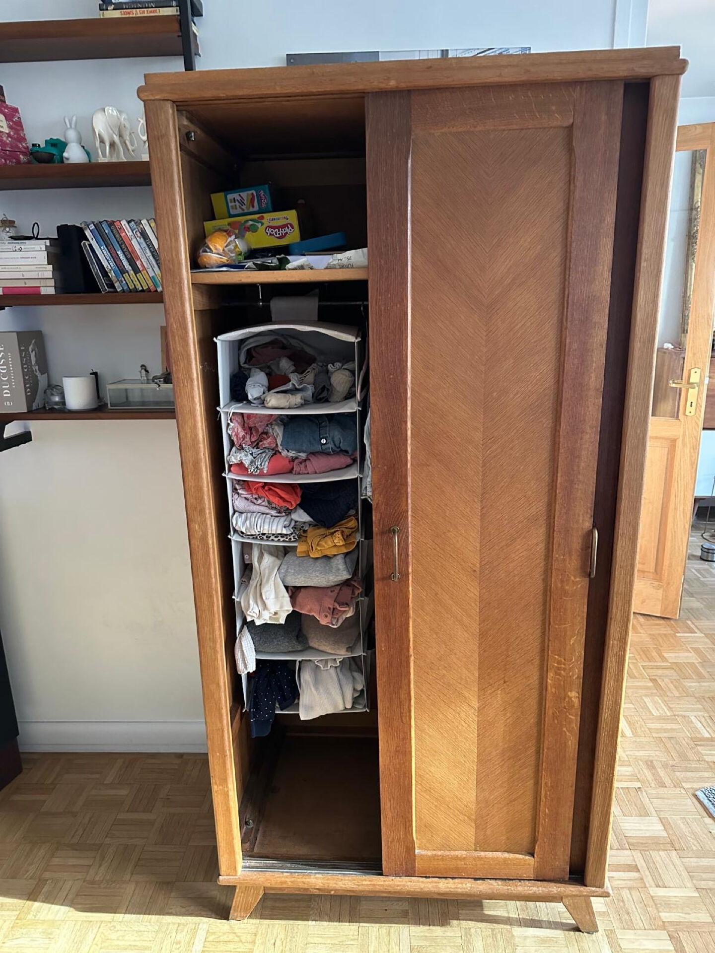 Scandinavian wooden wardrobe with sliding doors
