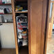 Scandinavian wooden wardrobe with sliding doors
