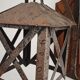 Wall lamp in wrought iron and old wood