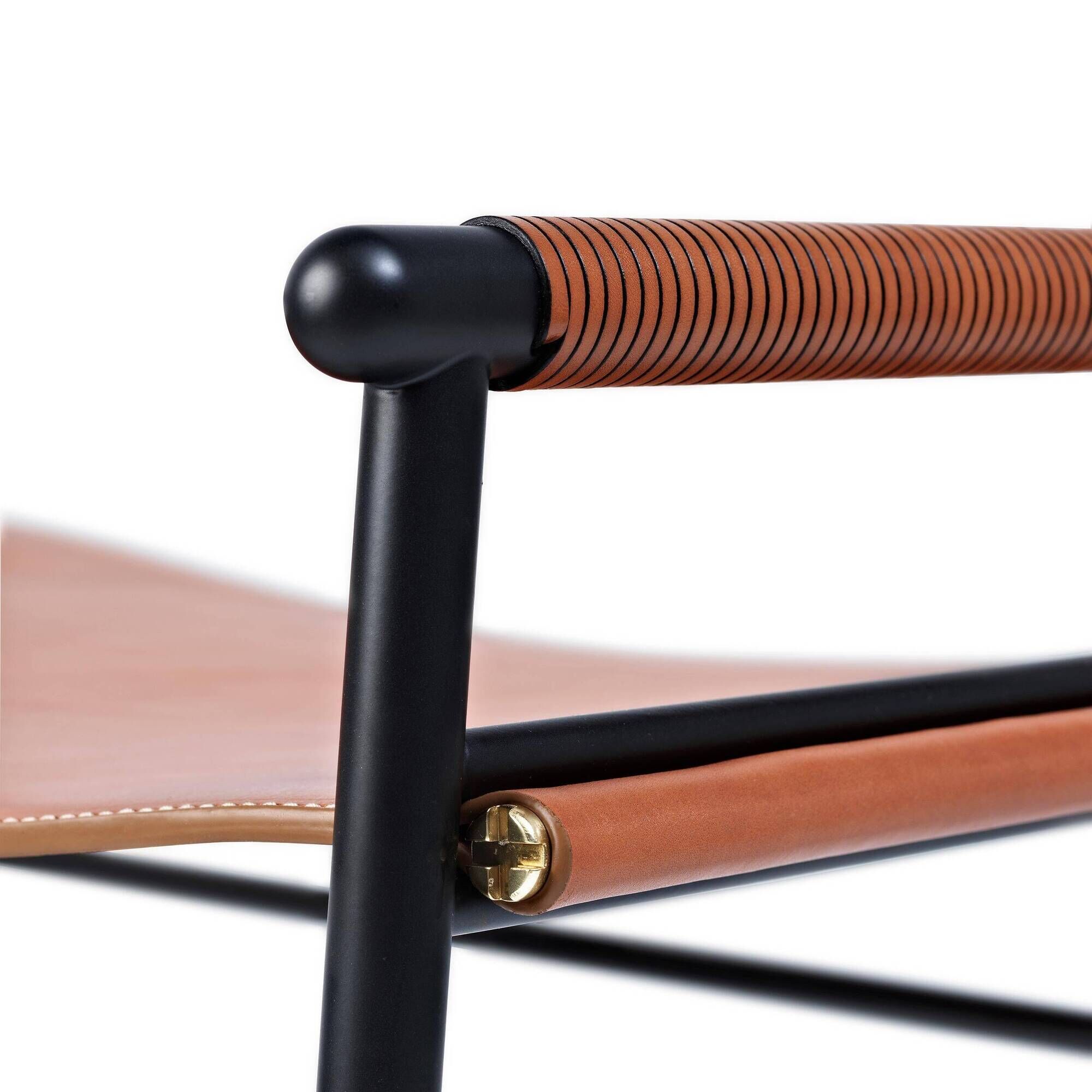 Set of 3 contemporary bar stools in natural brown leather and black rubber.