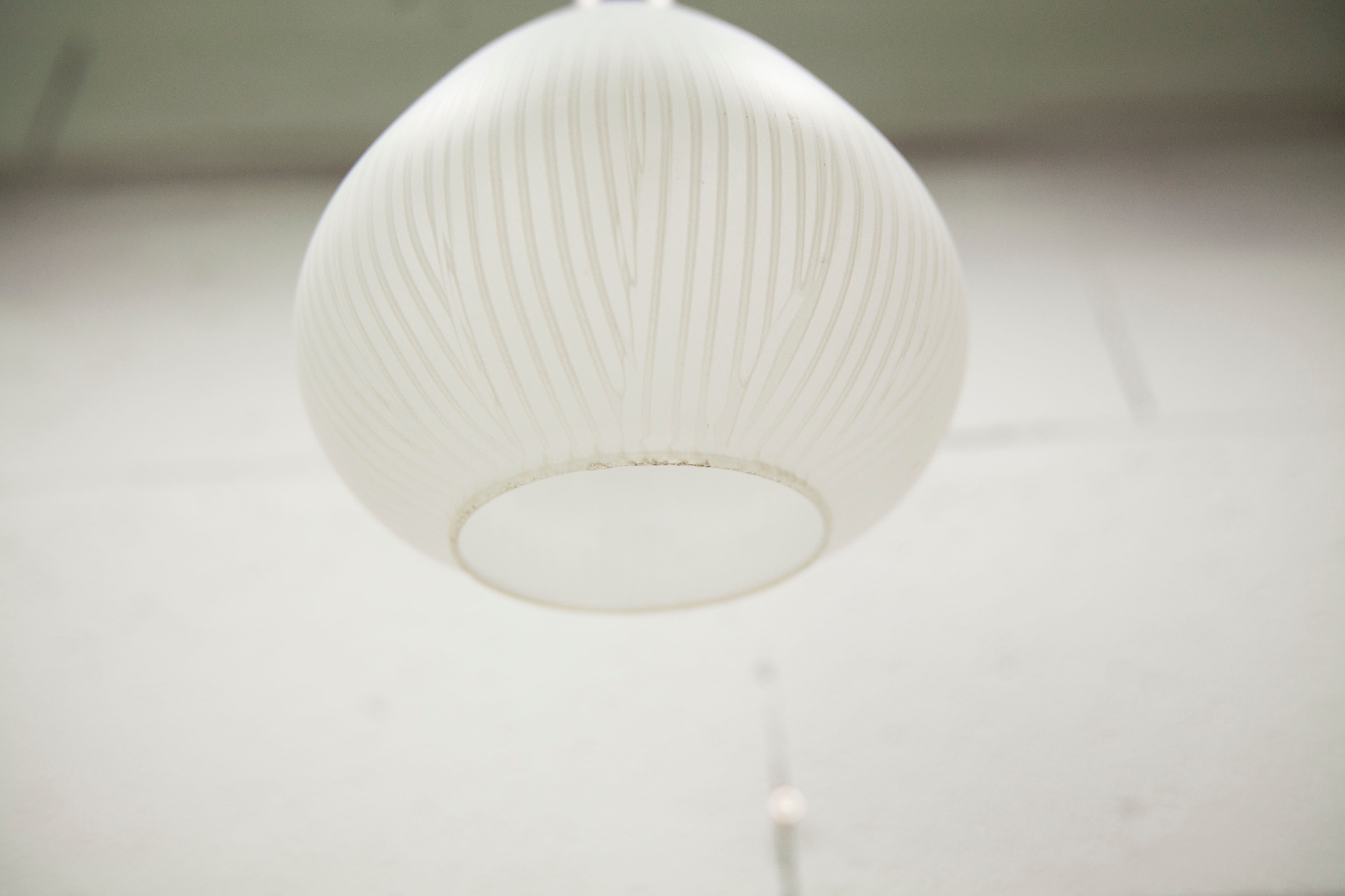 Mid century suspension, brass, zebra glass