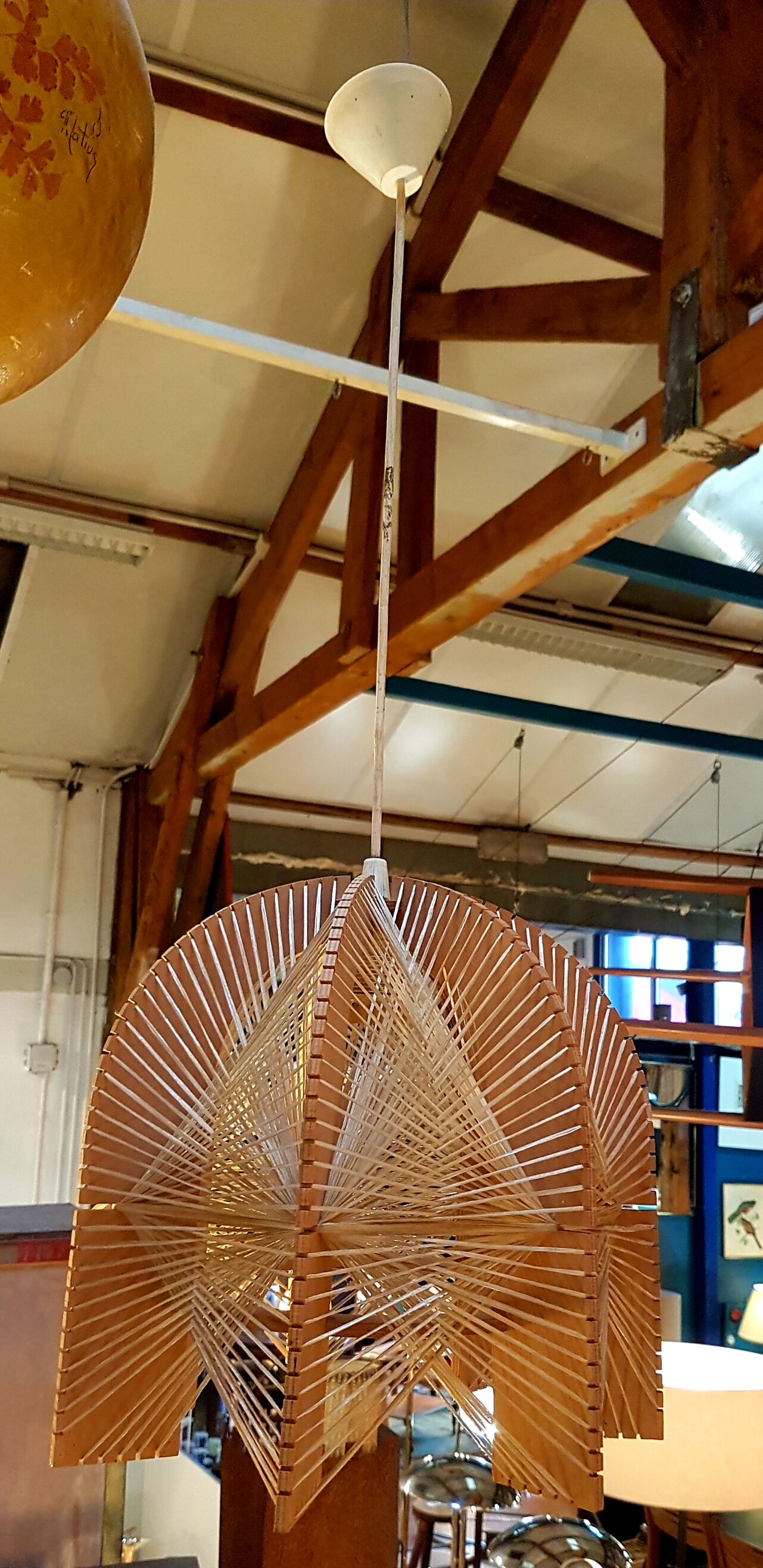 Hanging lamp in wood cut out clear raffia geometrical drawings 1970