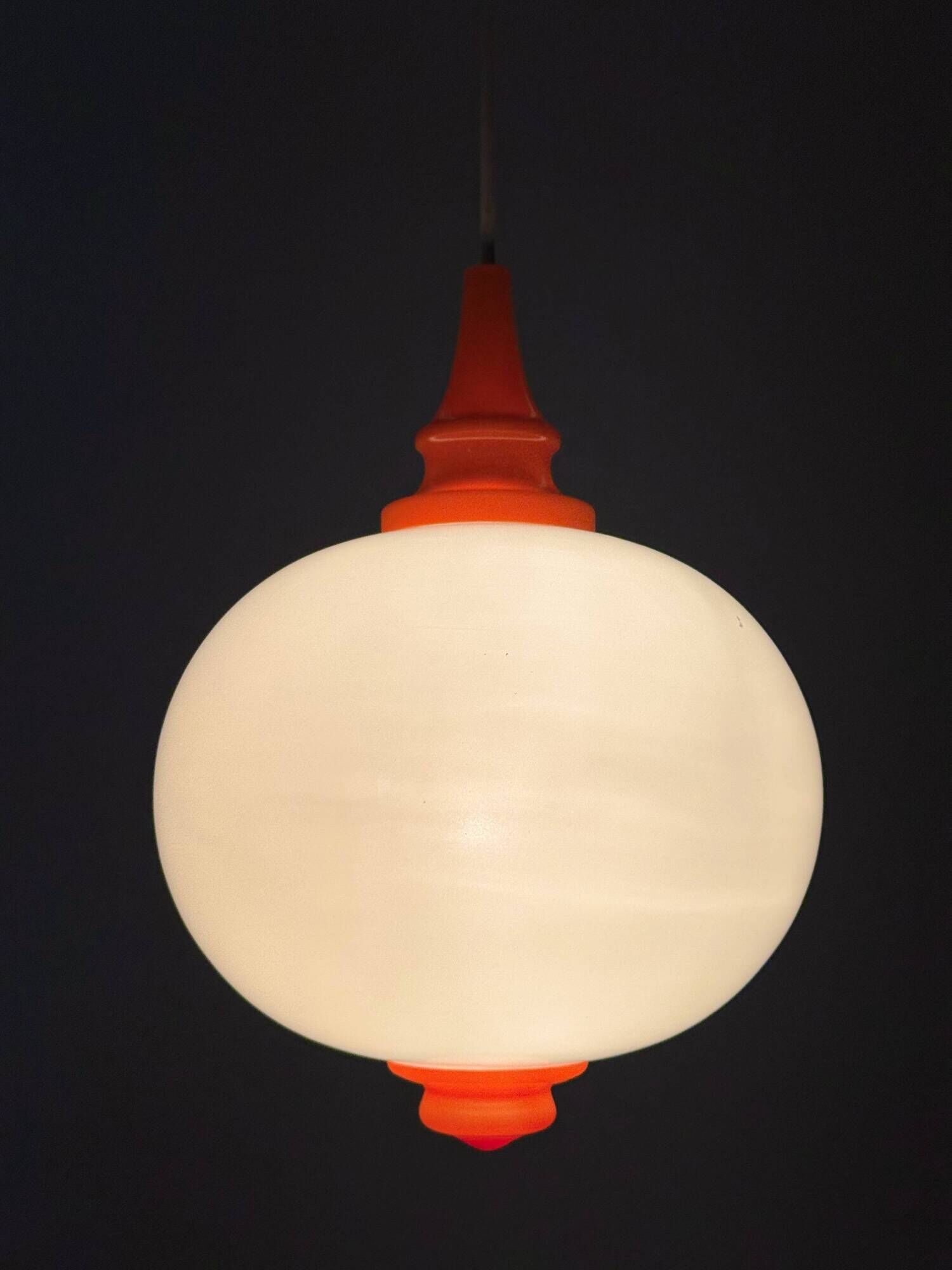 Space Age pendant lamp with milk glass ball and orange accents