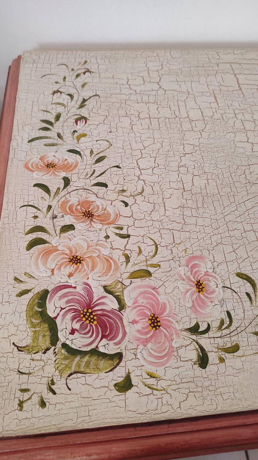 Painted chest of drawers with floral decoration