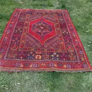 Old Moroccan carpet, made of natural wool and handwoven.