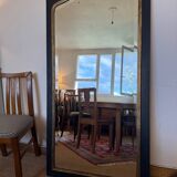 Large vintage black and gold wooden mirror