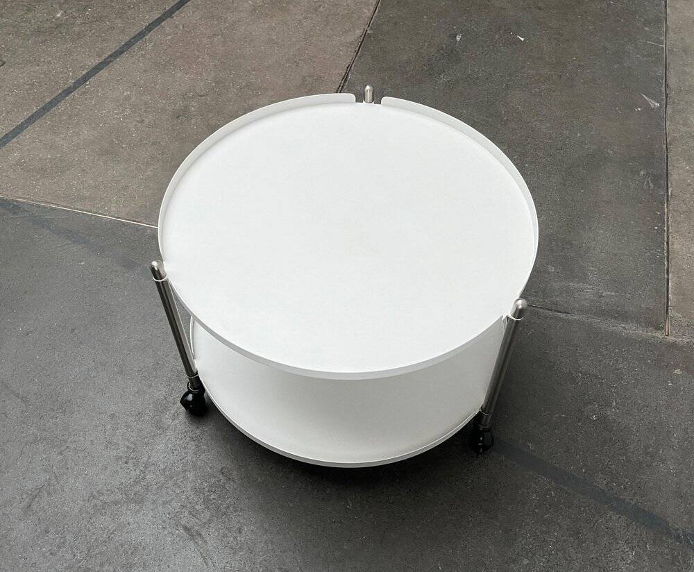 Minimalist Thrill metal coffee table or side table with wheels by Leitmotiv.