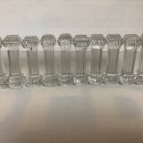 Ten old molded glass knife holders